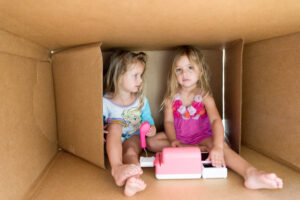 Children playing in a box